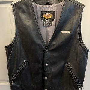 Genuine vintage Harley Davidson black leather vest. Size large.